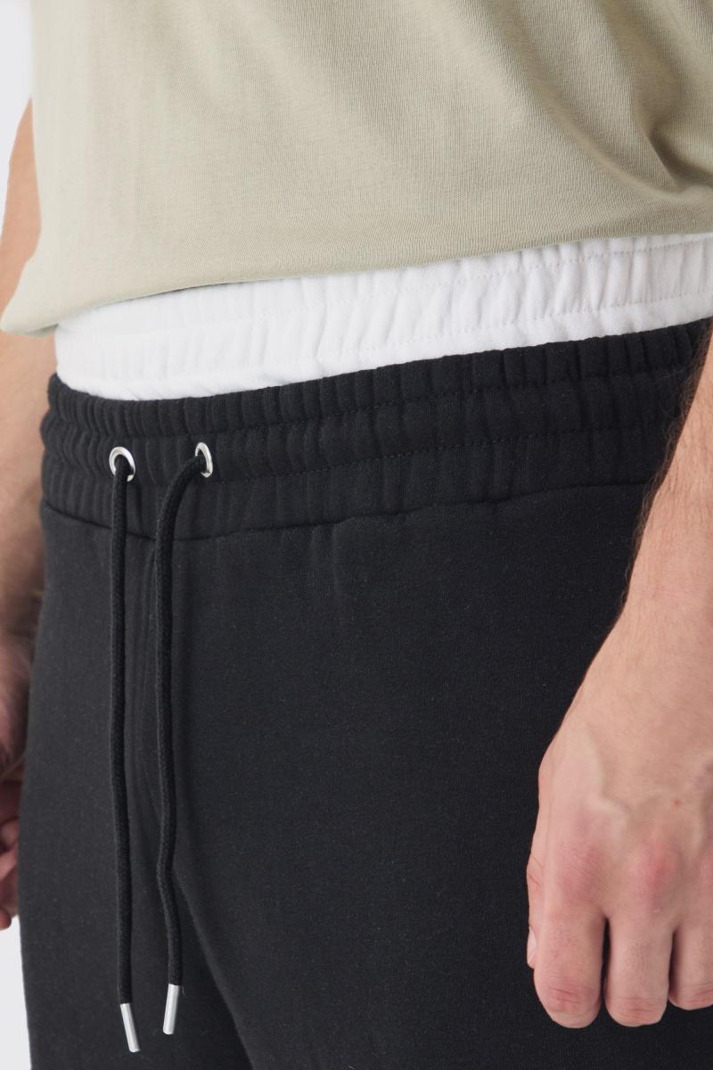 Високий подвійний пояс мішкуваті підходить до днища трикотажу в чорному