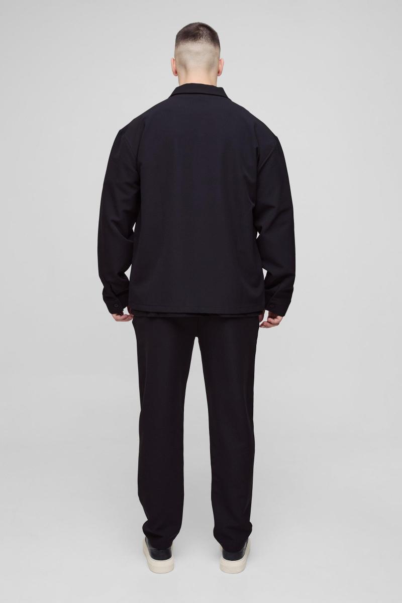 Високі стрейч-ткані звужені штани