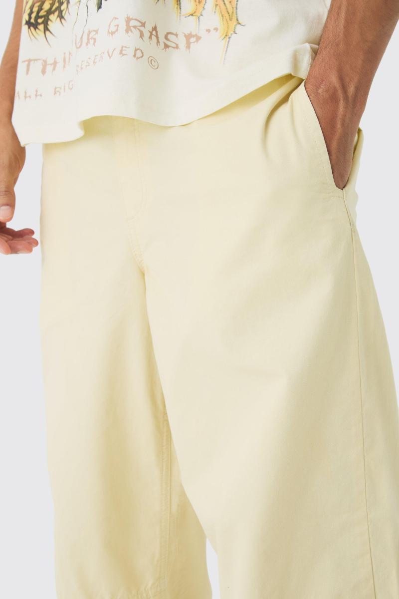 Мішкуваті штани-парашути з еластичною талією