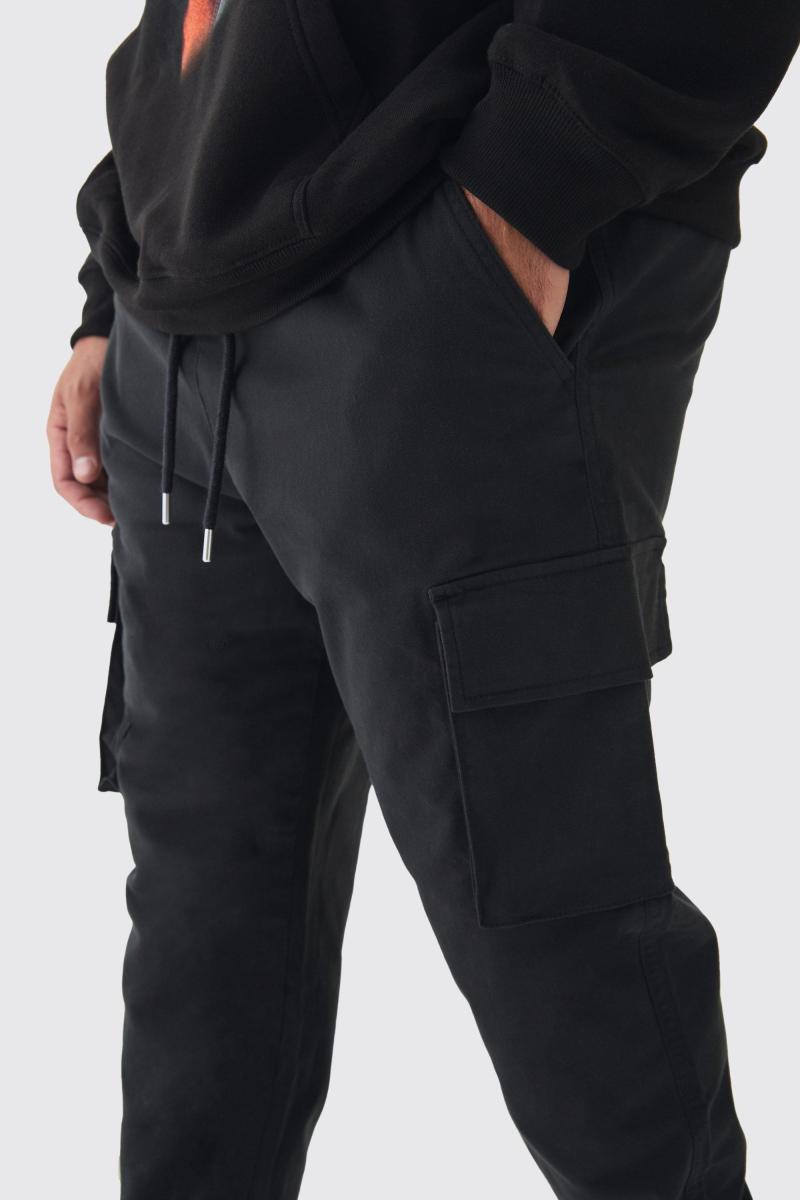 Плюс приталені брюки карго з еластичною талією та манжетами